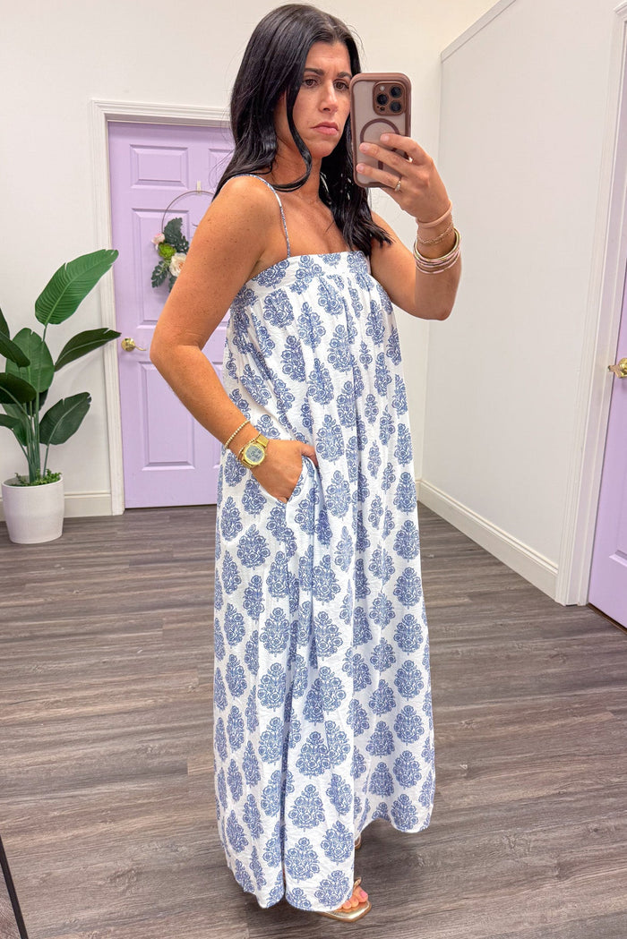 white and blue abstract floral print sleeveless maxi dress with side pockets