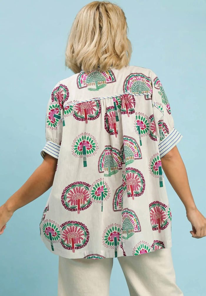 Umgee button front cream top with multicolor abstract print and a tiered detail in back in plus size
