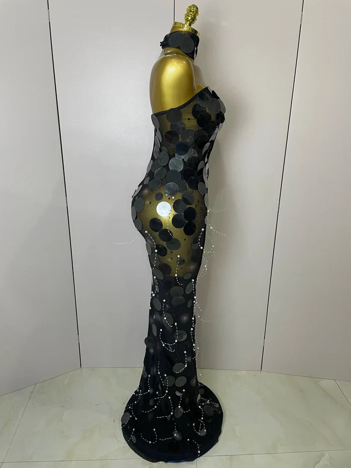 Alana sparkly pearl sequin backless floor-length evening dress with shimmering details.
