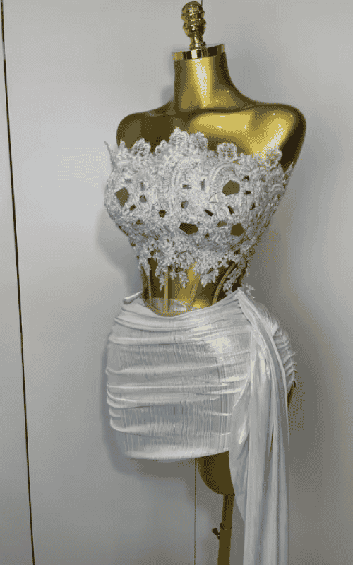 Amaris sparkly silver sequin two piece dress set. Strapless sexy short outfit for birthdays, parties, club nights, and evening events.
