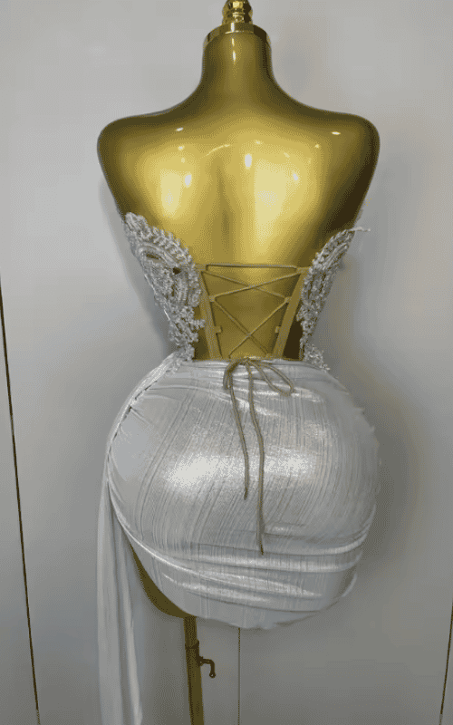 Amaris sparkly silver sequin two piece dress set. Strapless sexy short outfit for birthdays, parties, club nights, and evening events.