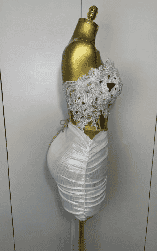 Amaris sparkly silver sequin two piece dress set. Strapless sexy short outfit for birthdays, parties, club nights, and evening events.