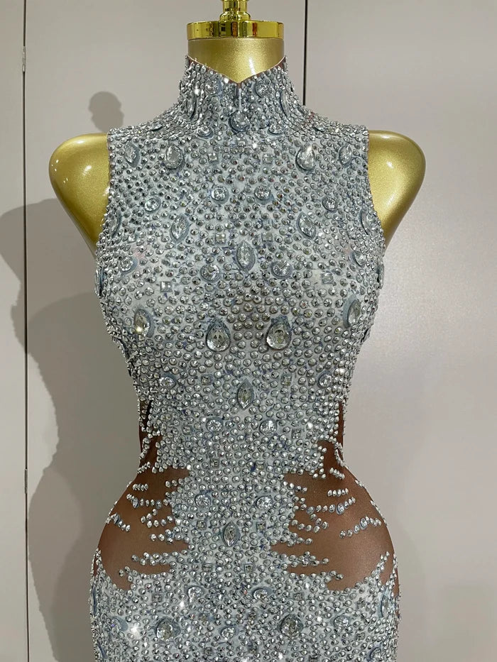 Luxury sleeveless rhinestone bodycon jumpsuit with sparkling crystals for stage or night-out wear.