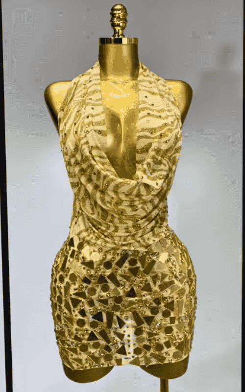 Arielle gold backless mini dress with deep V neck design. Sexy elegant outfit for prom, birthdays, nightclub, and photoshoot events.