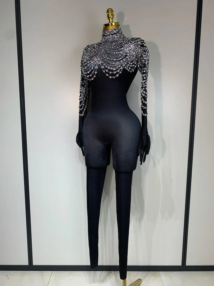 Audre luxury rhinestone stretch jumpsuit with shimmering rhinestones and fitted silhouette.