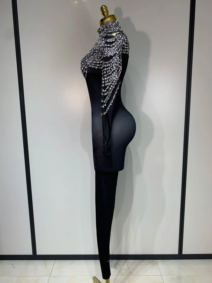 Audre luxury rhinestone stretch jumpsuit with shimmering rhinestones and fitted silhouette.