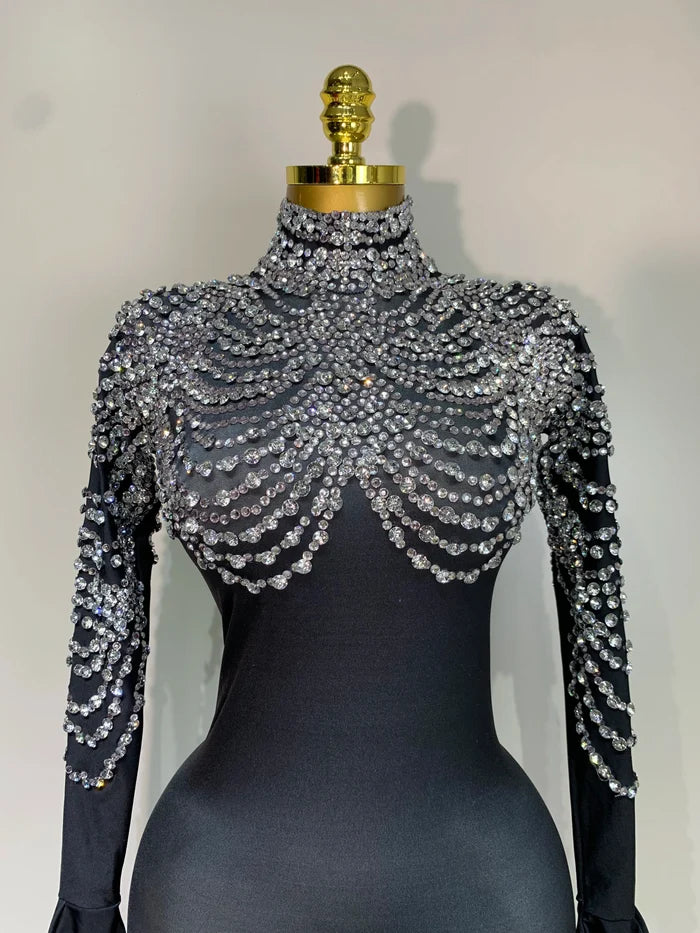 Audre luxury rhinestone stretch jumpsuit with shimmering rhinestones and fitted silhouette.