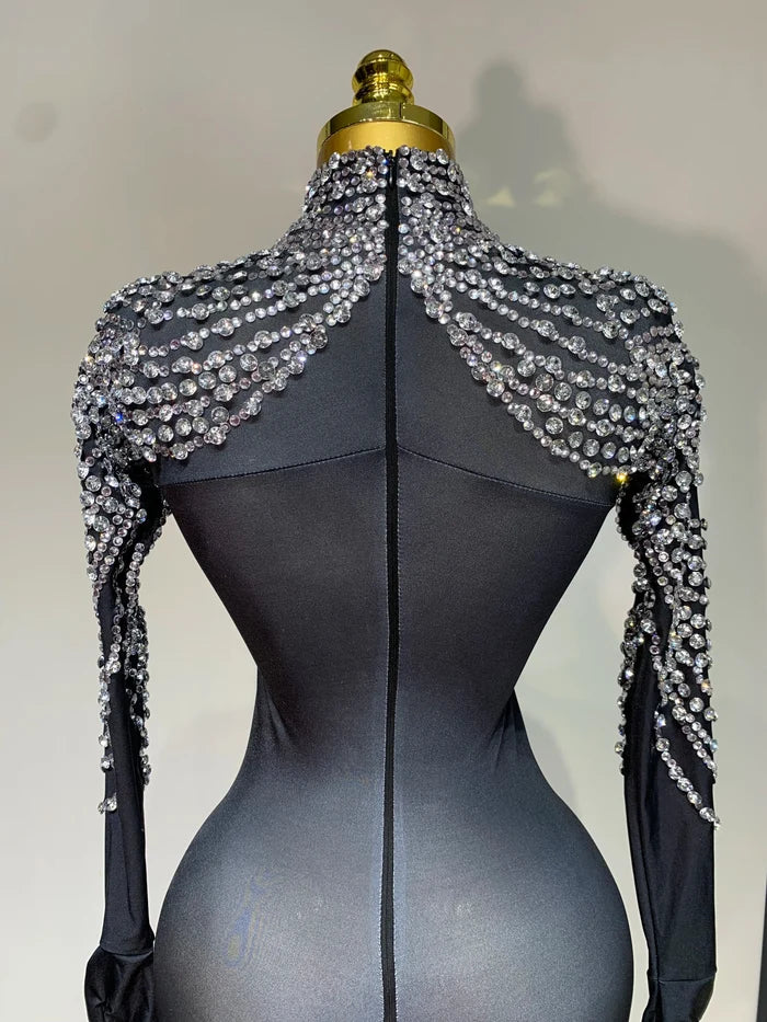 Audre luxury rhinestone stretch jumpsuit with shimmering rhinestones and fitted silhouette.