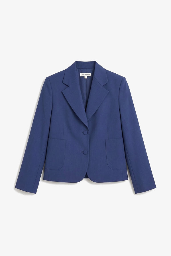 Blue blazer on a light gray background | Still | Exclude