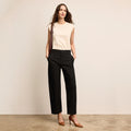 Woman wearing black jeans | Lead