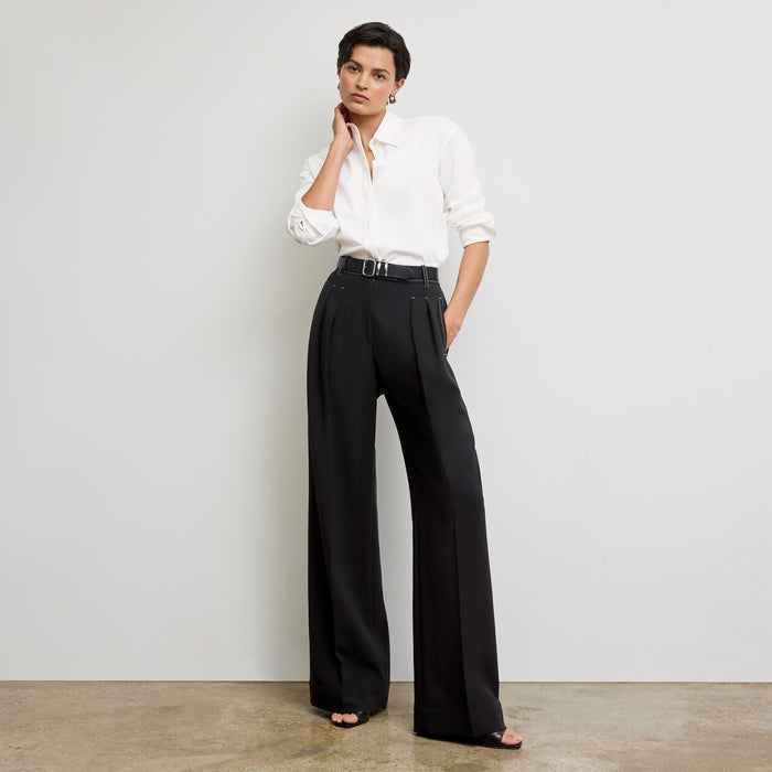 front image of a woman wearing the bia pants in black with topstitch | Exclude