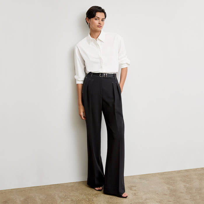 front image of a woman wearing the bia pants in black with topstitch