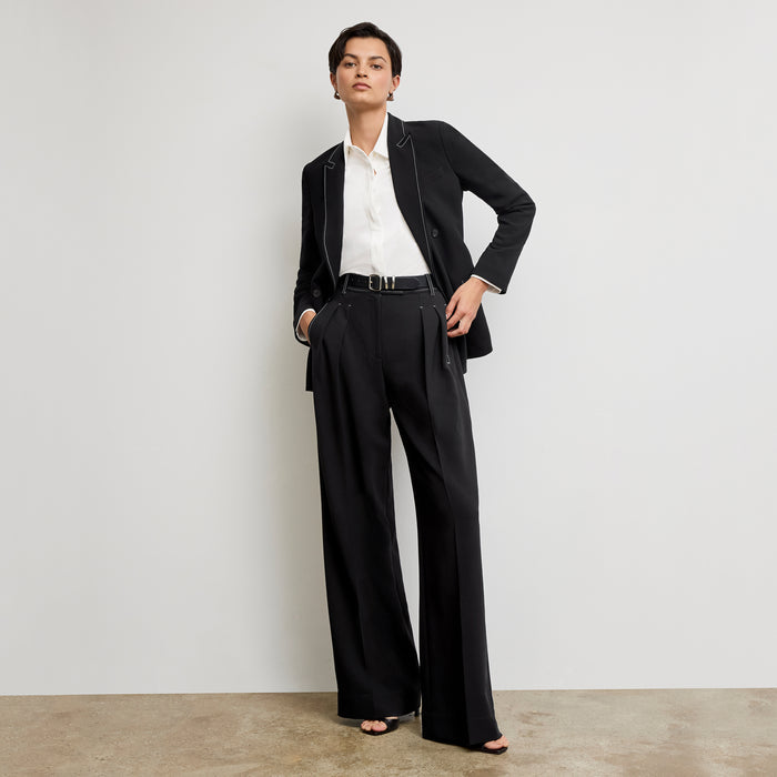 front image of a woman wearing the bia pants in black with topstitch