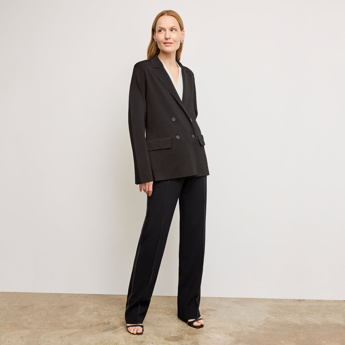 front image of a woman wearing the cody jardigan in black | Exclude