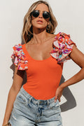 Body orange en tricot côtelé à manches volantées *-A WOMAN WE LOVE
