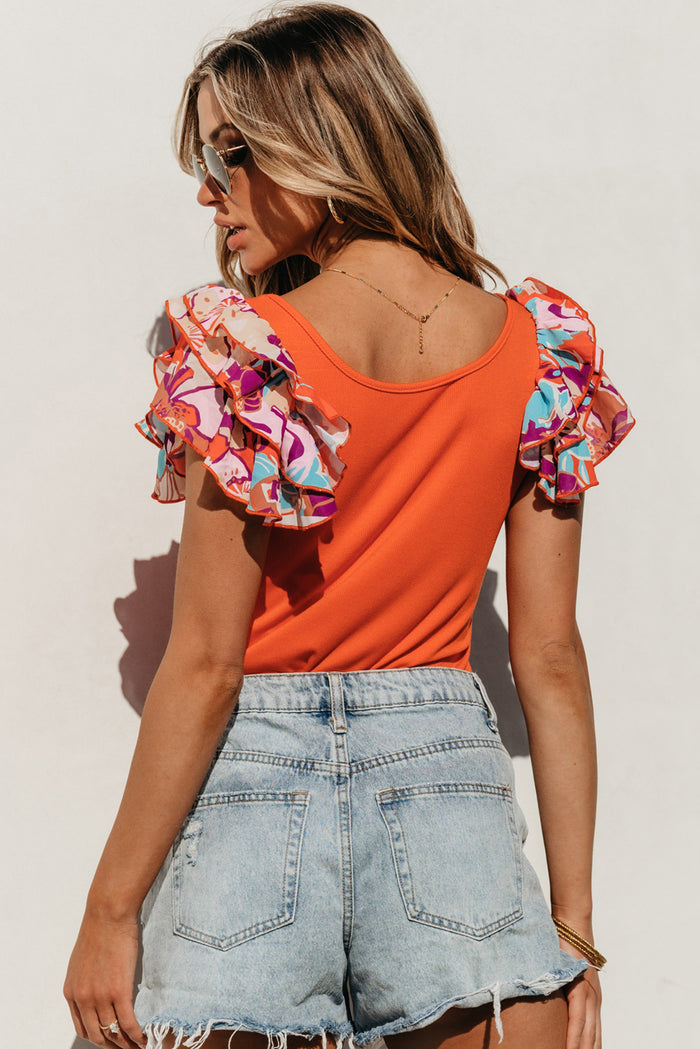 Body orange en tricot côtelé à manches volantées *-A WOMAN WE LOVE
