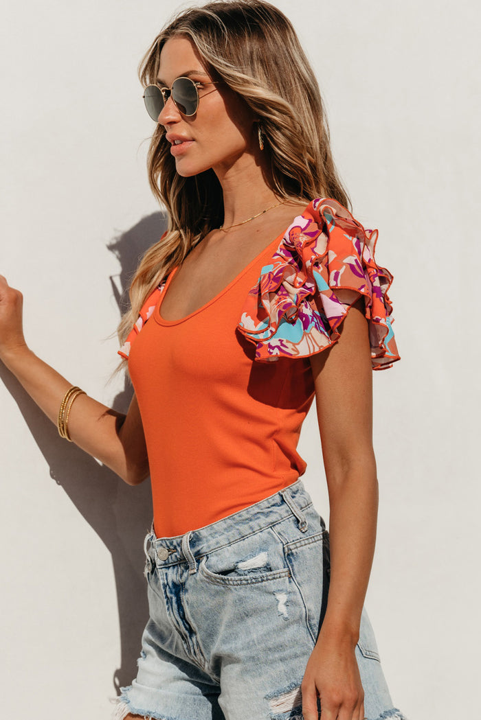Body orange en tricot côtelé à manches volantées *-A WOMAN WE LOVE