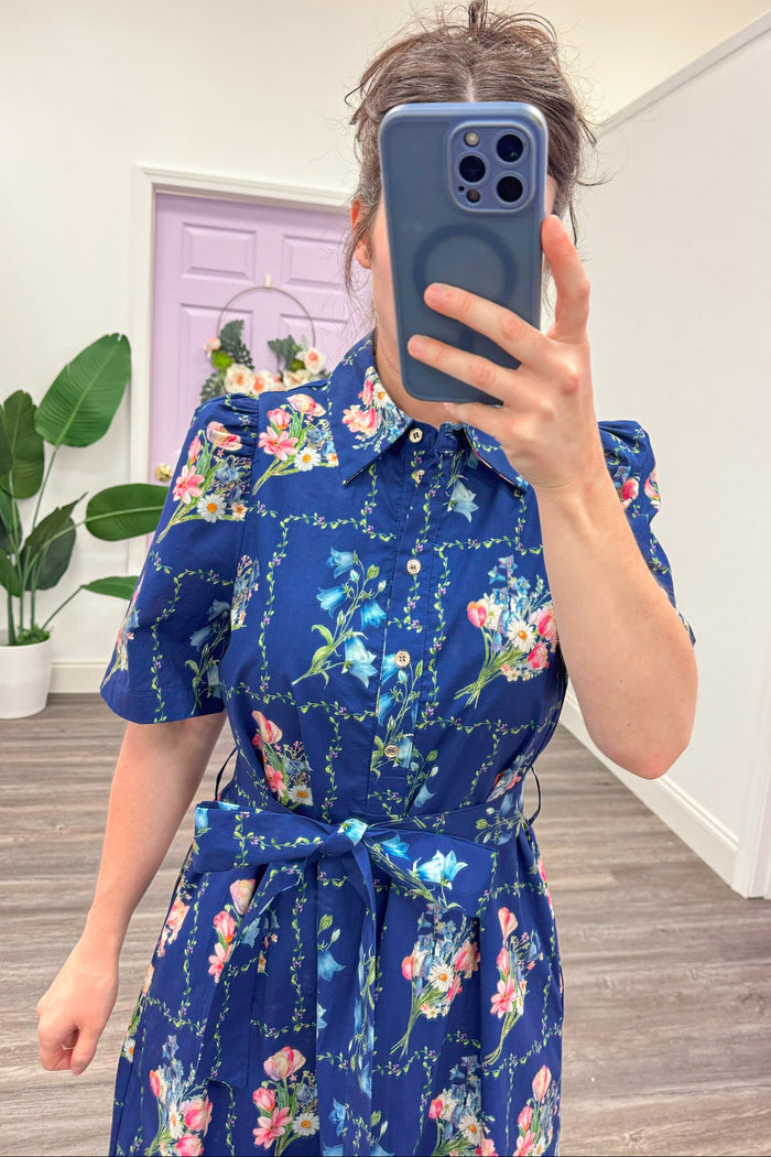 navy with pastel floral print collared neckline button front bodice midi dress