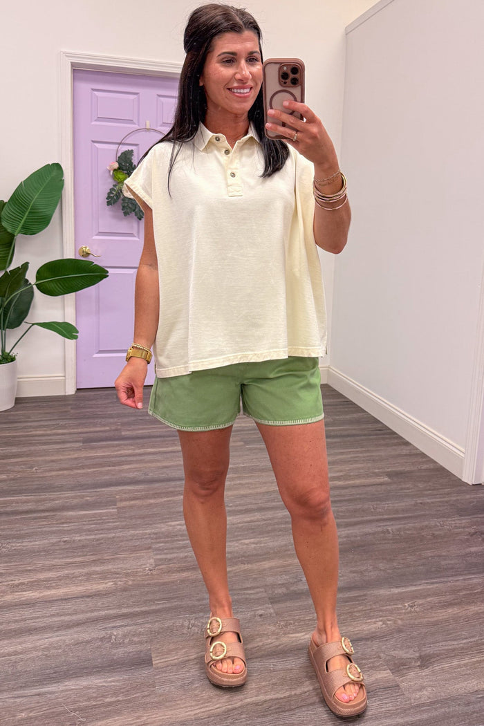solid cream mineral washed cap sleeve polo top with button front collared bodice