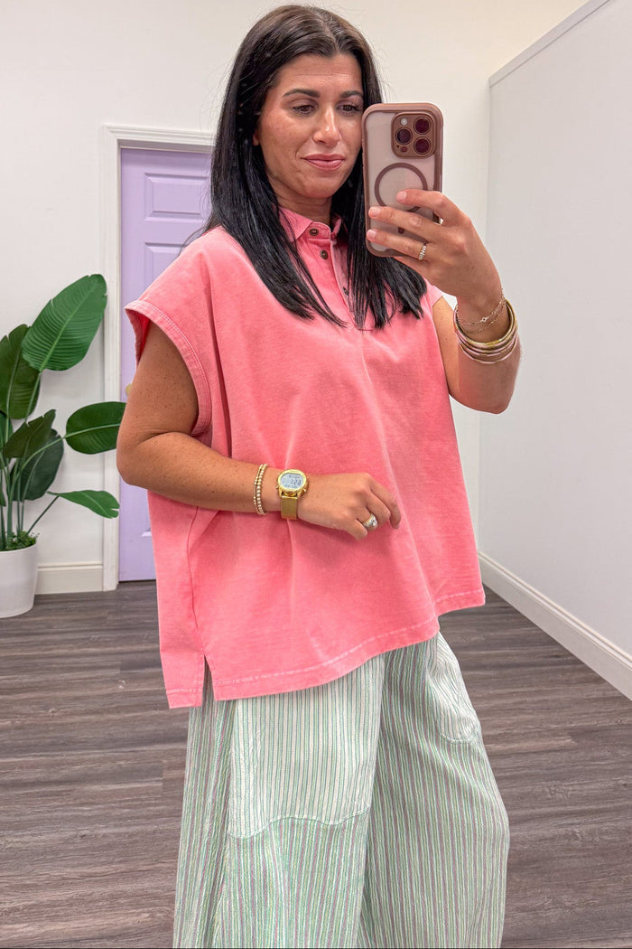 solid pink mineral washed cap sleeve polo top with bottom hem side slits