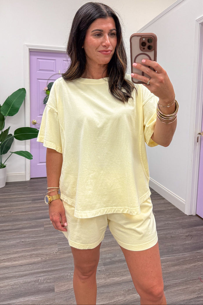 solid washed butter yellow short sleeve crew neckline knit top
