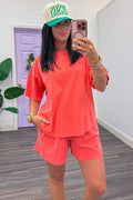 washed coral drop shoulder short sleeve casual knit top
