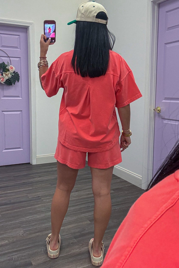 washed coral drop shoulder short sleeve casual knit top with reverse seam details