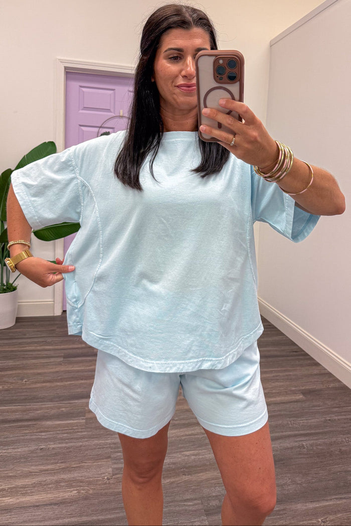 light blue drop shoulder short sleeve casual knit top relaxed silhouette