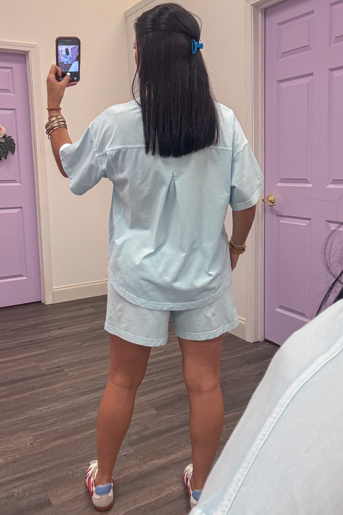 pale blue drop shoulder short sleeve casual knit top rounded bottom hem