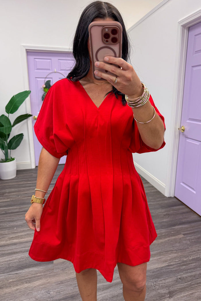 red pleated pintuck detail dolman sleeve v neckline mini dress