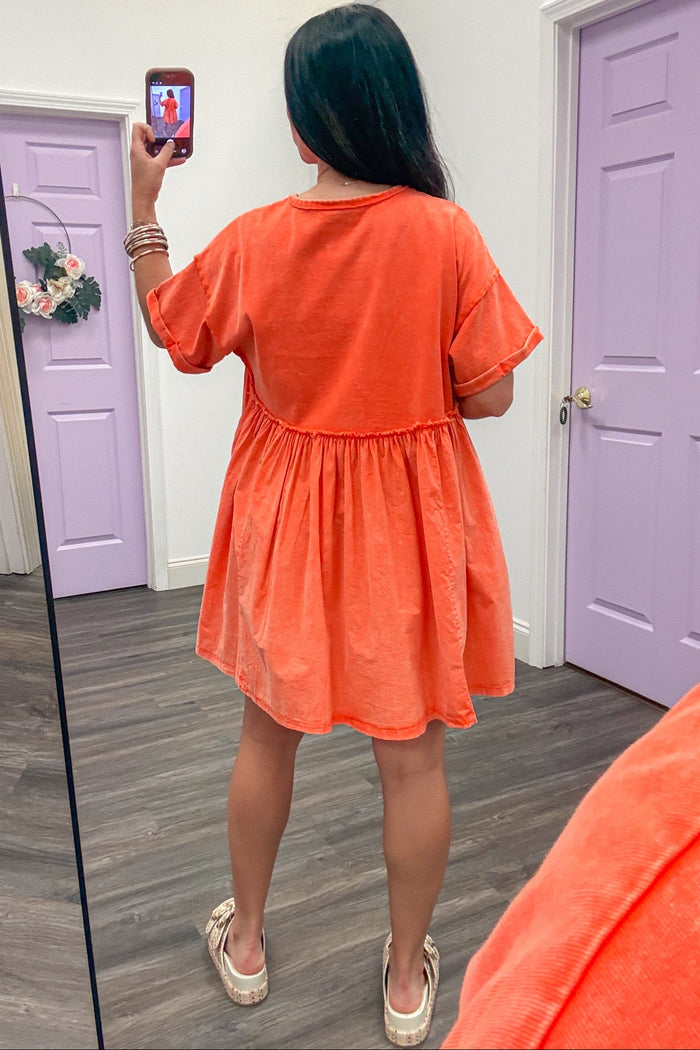 solid washed orange short sleeve reverse seam details short babydoll dress