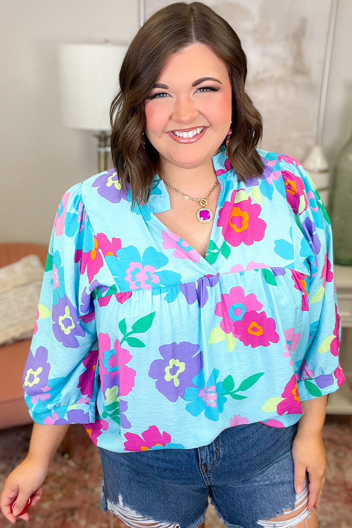 Chemisier babydoll bleu clair à imprimé floral et col en V cranté de grande taille-A WOMAN WE LOVE