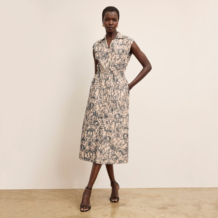 front image of a woman wearing the cira dress in warped floral | Lead