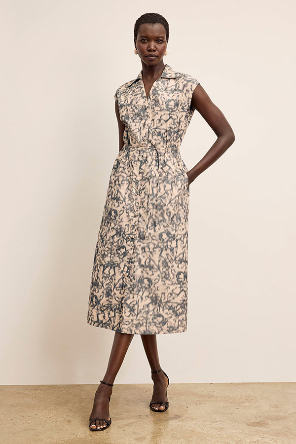 front image of a woman wearing the cira dress in warped floral | Exclude | Grid