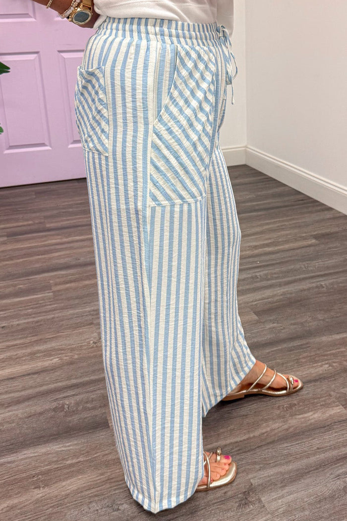 sky blue and cream striped wide leg elastic waist lightweight fabric pants with back pockets