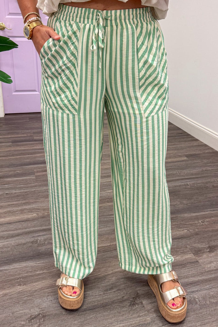 sage green and cream striped lightweight fabric wide leg pants with front pockets