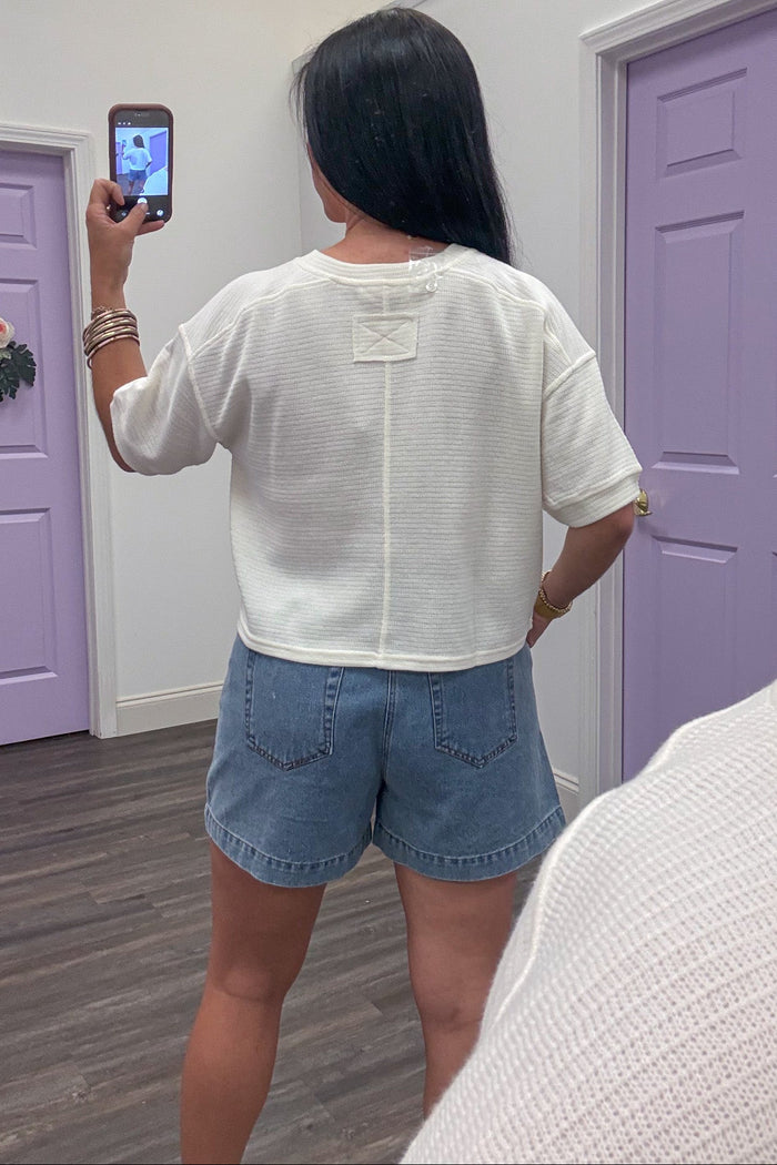 cream button front short sleeve cardigan top