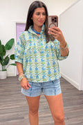 blue green and cream floral print button front short sleeve poplin top