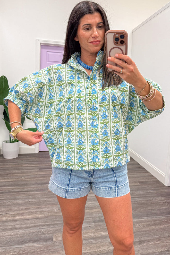 blue green and cream floral print button front short sleeve relaxed silhouette poplin top