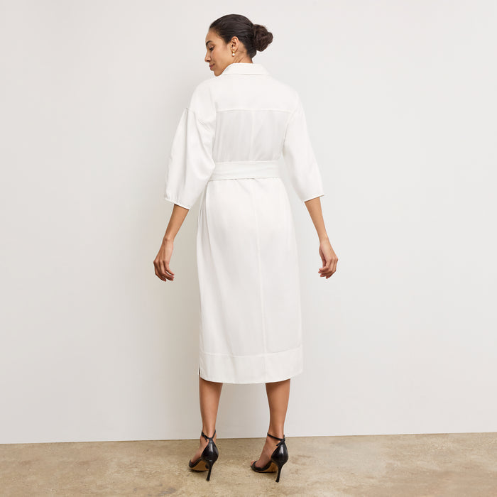 Back image of a woman wearing the Fanfan Dress in White