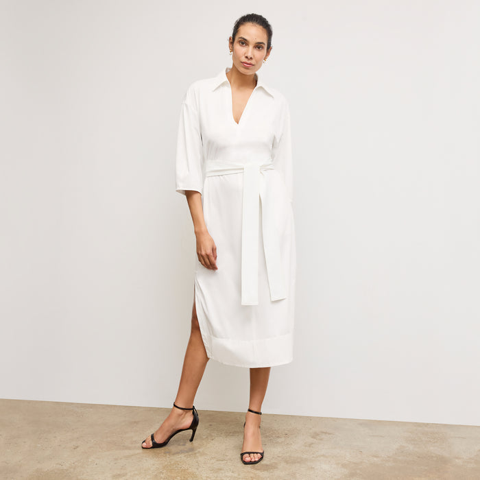 Front image of a woman wearing the Fanfan Dress in White