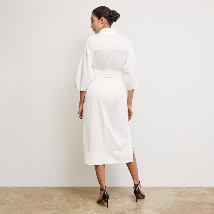 Back image of a woman wearing the Fanfan Dress in White