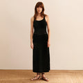 Front image of a woman wearing the Fina Dress in black | Lead