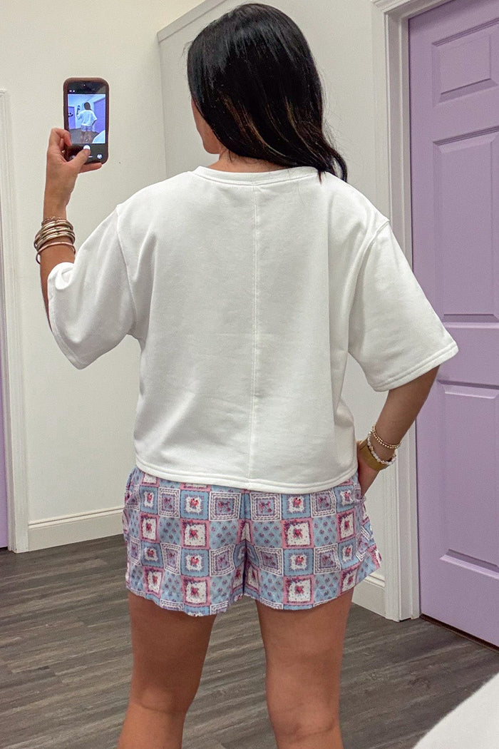 white with embroidered patchwork print usa crew neckline terry knit top