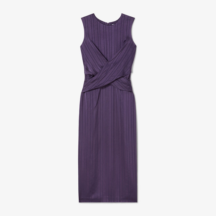 Purple dress with a criss-cross detail on a white background