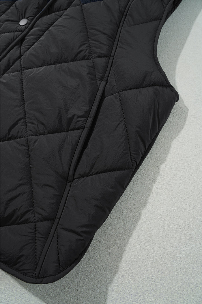 Gilet matelassé noir à col haut et poche boutonnée