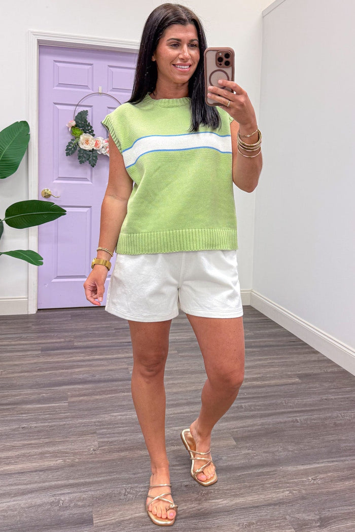 lime green with blue and cream colorblock crew neckline sleeveless knit top