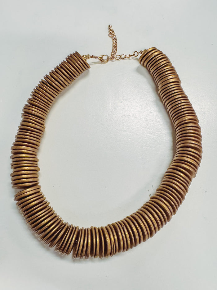 gold disk beaded statement necklace