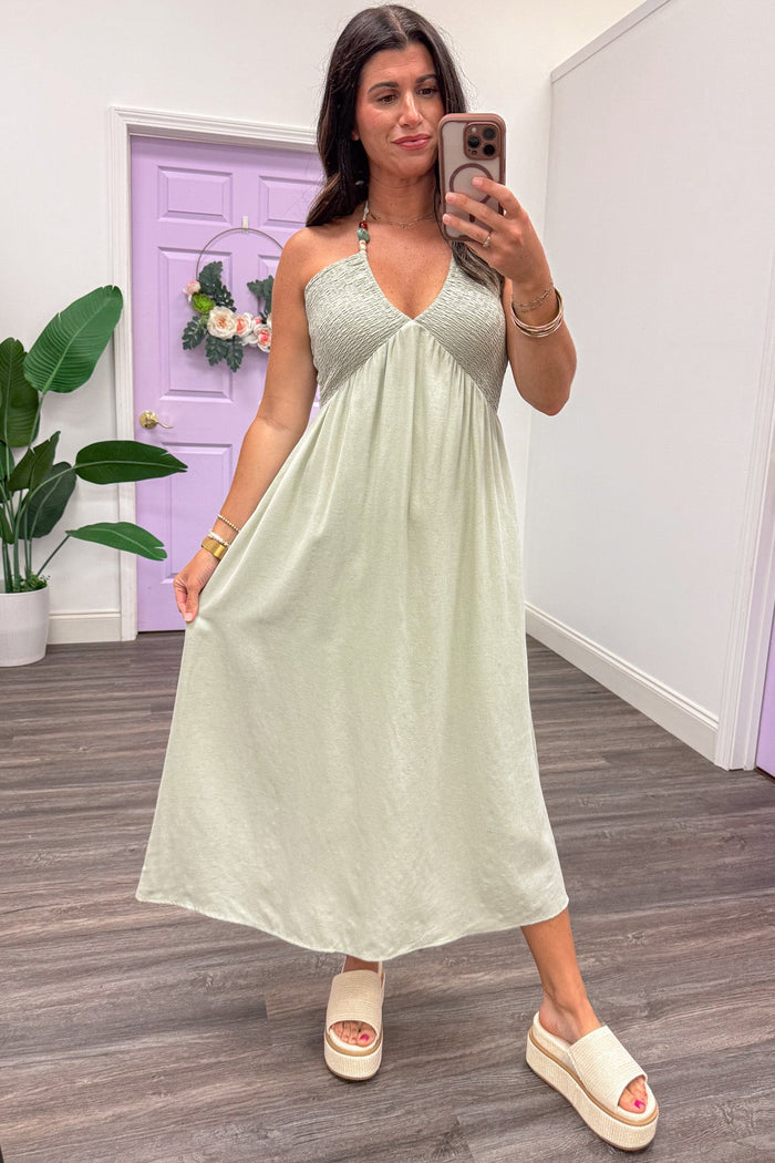 solid dusty sage green sleeveless v neckline flowy halter midi dress