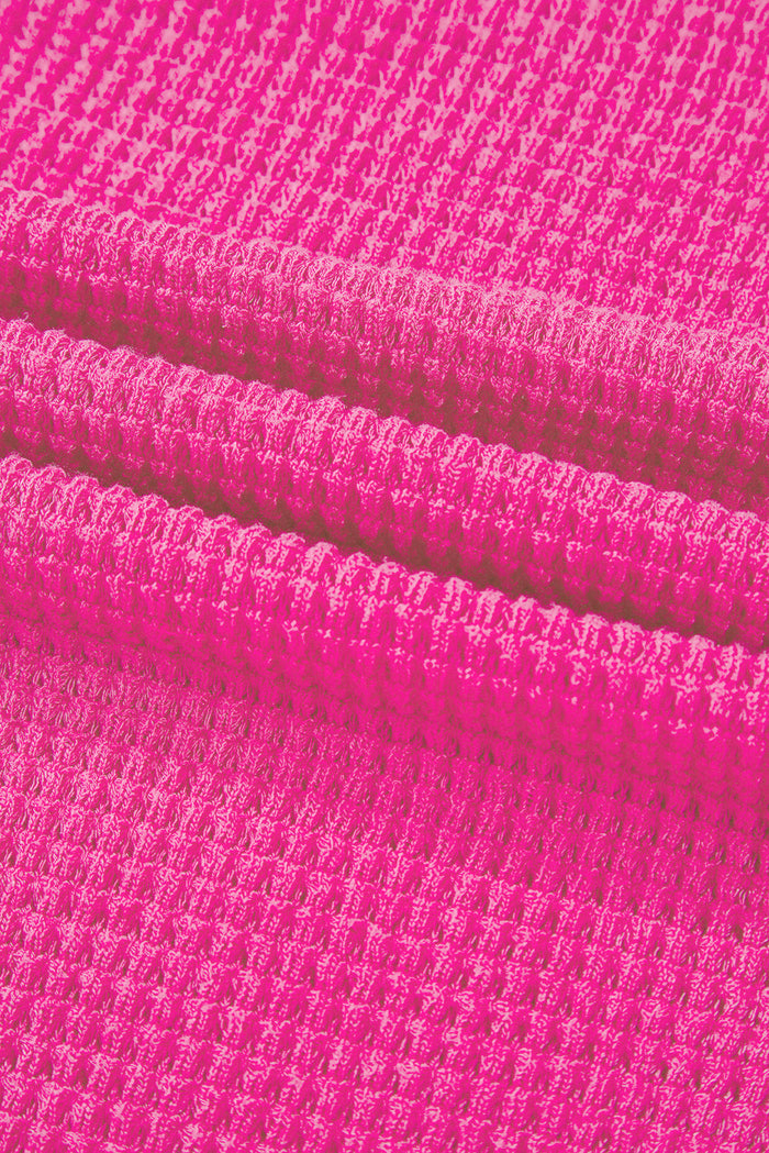 Haut ample à col en V et fentes latérales en tricot *